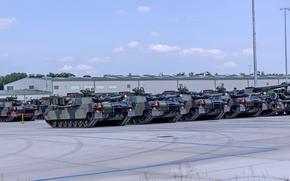 Personnel stage M1 Abrams tanks at the Powidz APS-2 Worksite on June 27, 2024, in Powidz, Poland. The Powidz site received the standard makeup of a U.S. Army armored brigade combat team. 
