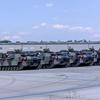 Personnel stage M1 Abrams tanks at the Powidz APS-2 Worksite on June 27, 2024, in Powidz, Poland. The Powidz site received the standard makeup of a U.S. Army armored brigade combat team. 