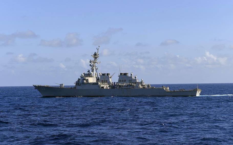 The guided-missile destroyer USS Milius steams in the South China Sea, Nov. 20, 2021, three days before it passed through the Taiwan Strait. 