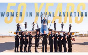 A video screen grab shows a slide celebrating the 50 years that women have been in naval aviation. Navy Blue Angels pilot Lt. Cmdr. Amanda Lee is in the cockpit of her aircraft in the center.
