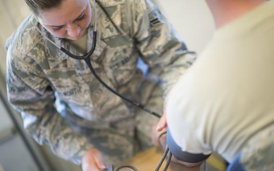 U.S. Air Force airman 1st Class Meghan Wentworth, from the 158th Medical Squadron, checks vitals for Airmen as part of their medical examinations at the Vermont Air National Guard in South Burlington, Vt., June 6. The VTANG has become the first Air Guard base to process both Preventative Health Assessments and Occupational Health Physical Examinations in one large push, improving the medical experience for both sides, and creating a cost-saving and efficient format for other bases to emulate. (U.S. Air National Guard photo by Senior Airman Jon Alderman)