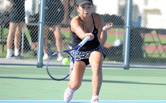 Humphreys' Chloe Lee was quite busy Friday. She prevailed in the D-I girls singles and doubles finals, captured the girls overall singles championship and finished second in the overall doubles final of the Far East tournament.