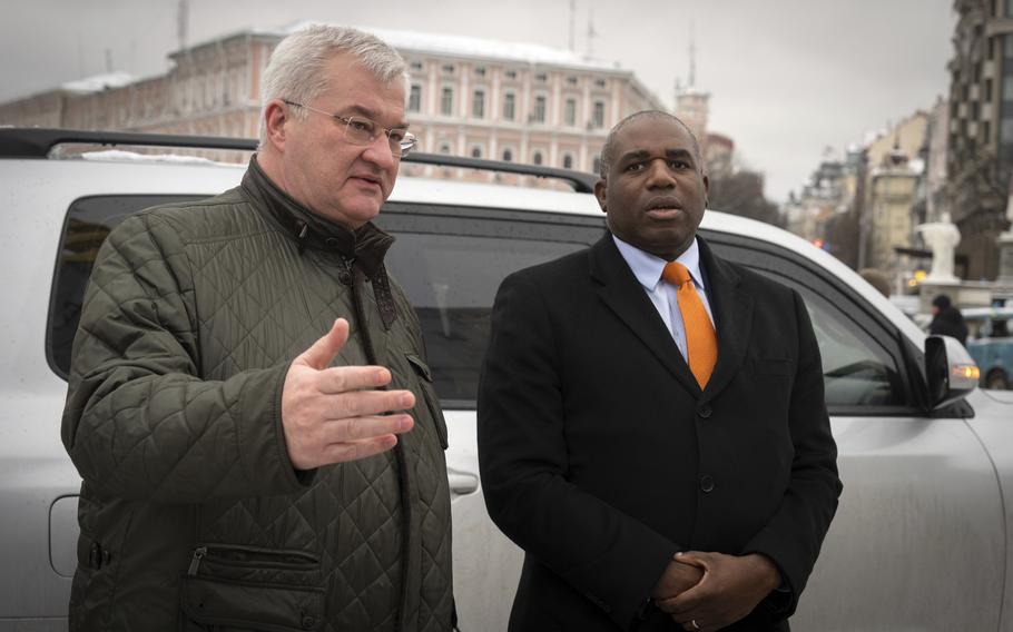 Britain’s Foreign Secretary David Lammy, right, speaks to Ukraine’s Foreign Minister Andriiy Sybiha