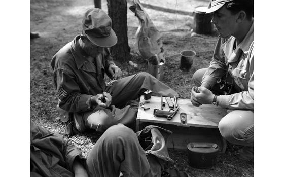 Grafenwoehr, Germany, Aug. 28, 1947: Staff Sgt John L. Bell, L Company, 18th Infantry Division  cleans his pistol after shooting. SSgt. Bell participated in the pistol matches at the Infantry Training Center at Grafenwoehr. Bell's match was one of many as soldiers battled for the honors to be the sharpest shooter in various pistol and rifle competions. 

Looking for Stars and Stripes’ historic coverage? Subscribe to Stars and Stripes’ historic newspaper archive! We have digitized our 1948-1999 European and Pacific editions, as well as several of our WWII editions and made them available online through https://starsandstripes.newspaperarchive.com/

META TAGS: Europe; Germany; U.S. Army; Infantry; sharp shooting competition