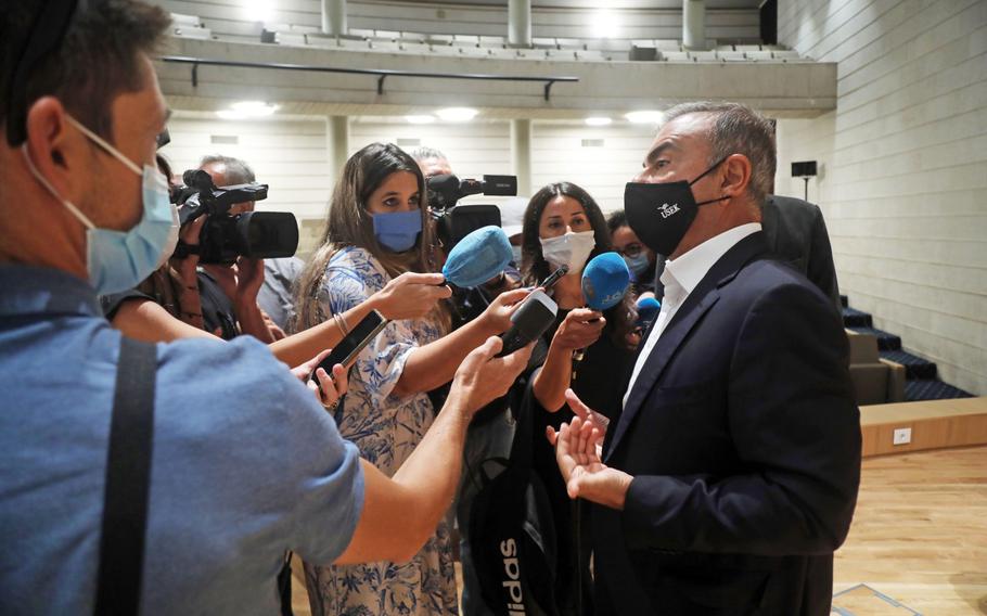 Carlos Ghosn, former Nissan chief executive officer, speaks to journalists following a news conference at the Holy Spirit University of Kaslik in Jounieh, Lebanon, on Sept. 29, 2020.