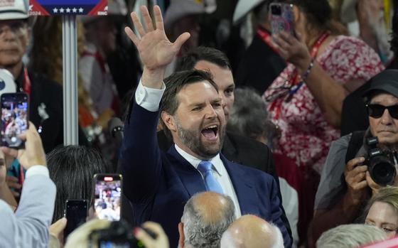 JD Vance waves to supporters after he was announced as Donald Trump’s vice presidential running mate during the first day of the Republican National Convention in Milwaukee on July 15, 2024.
