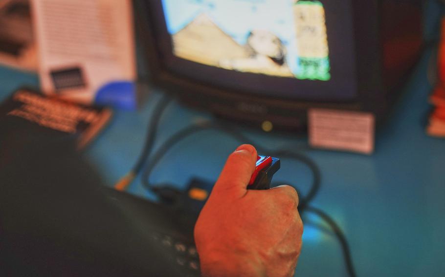 A patron at the Center for Computing History on Aug. 31, 2024, plays "Bomb Jack" on a Sinclair ZX Spectrum built in 1982. The museum in Cambridge, England, has a collection of nearly 15,000 video games to go along with its range of vintage and modern equipment. 