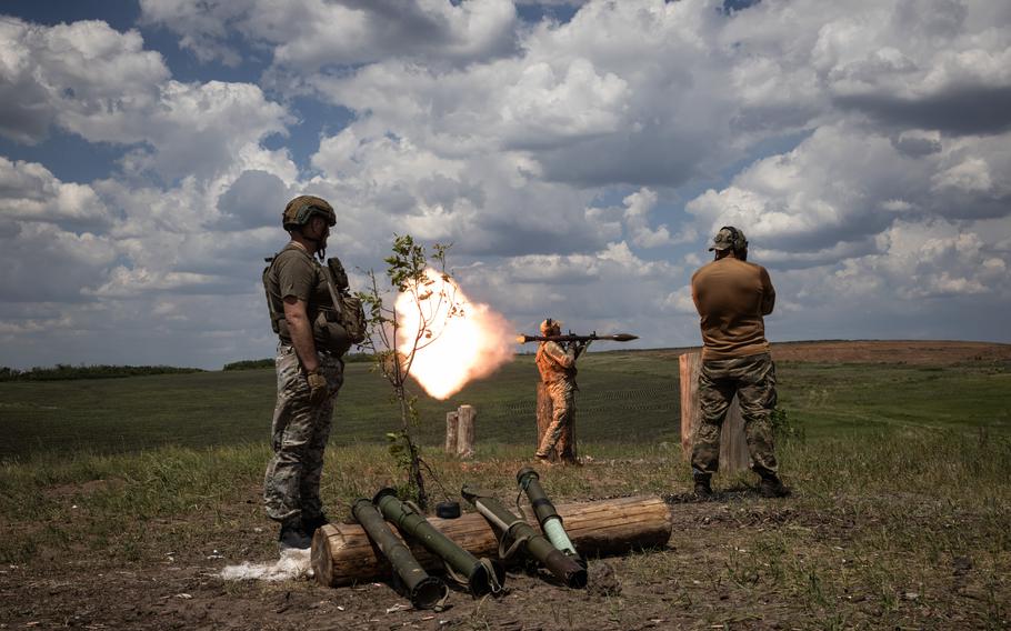 Soldiers from Ukraine’s 41st Brigade learn to fire rocket-propelled grenades in May in the Donetsk region. Kyiv’s forces are critically understaffed and losing ground. 