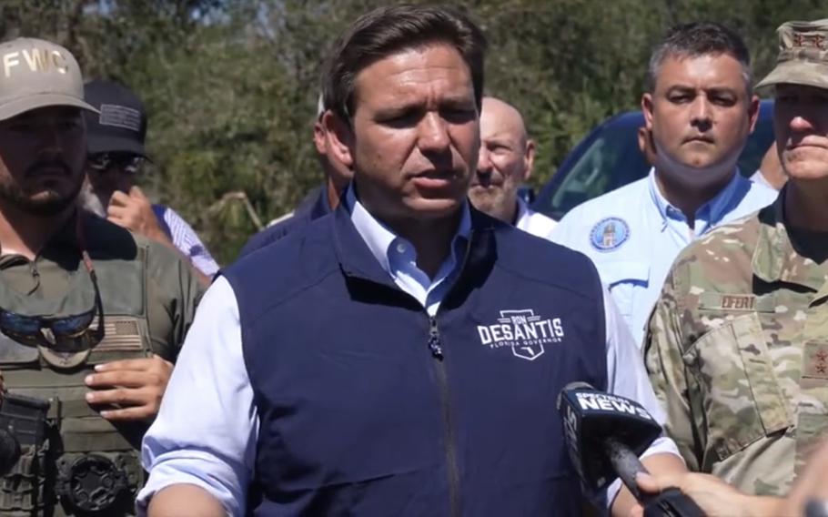 Governor of Florida Ron DeSantis talking with reporters.