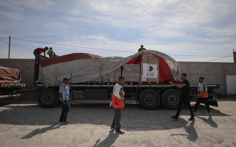 The first aid convoy arrives in Gaza through the Rafah land crossing on Saturday, Oct. 21, 2023.