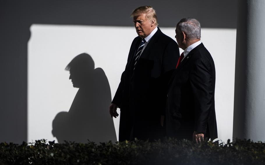 President Donald Trump walks with Netanyahu to the Oval Office on Jan. 27, 2020. 