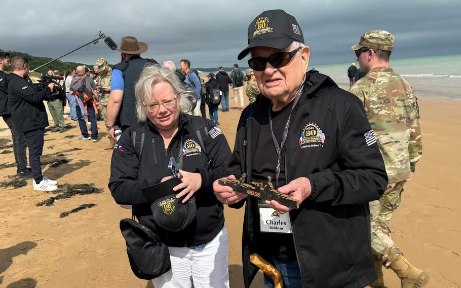 Charles Baldwin, a 102-year-old who was a pilot in the 23rd Fighter Squadron, visits Omaha Beach on June 4, 2024. He was part of a group of nearly 70 World War II veterans flown to France for the 80th anniversary of the D-Day landings.