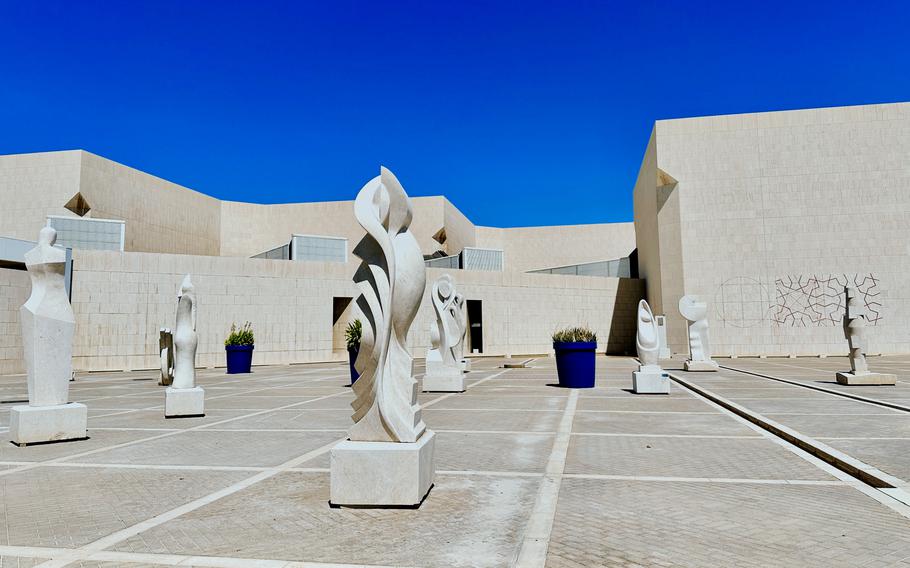 The white sculpture courtyard is a stunning prelude to the Bahrain National Museum, blending modern creativity with Bahrain's rich cultural heritage. The sculptures range from abstract forms to figurative representations.