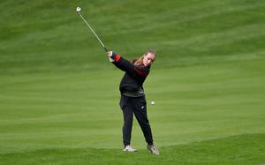 Kaiserslautern's Lola Wesseler hits the ball on the No. 18 hole during the first day of the DODEA European golf championships on Oct. 9, 2024, at Woodlawn Golf Course on Ramstein Air Base, Germany.