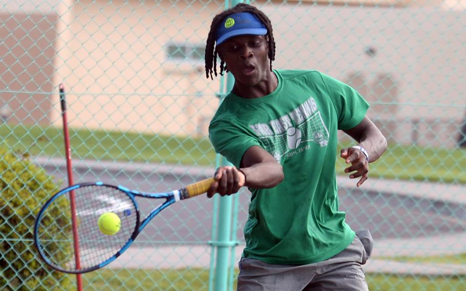 Senior Jai Bailey plays three sports for Yokota, including tennis in the fall.