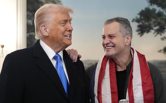 President Donald Trump, accompanied by Marc Fogel, speaks in the Diplomatic Reception Room at the White House.