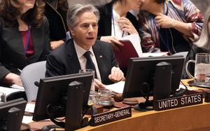 Secretary of State Antony Blinken speaks while seated at the desk for the U.S. at the UN Security Council.