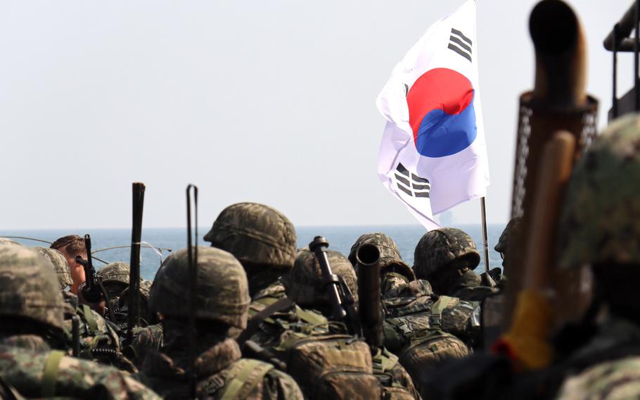 South Korean marines stand in formation during training with U.S. Marines in Pohang, South Korea, March 29, 2023. 