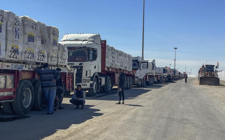 Trucks line up at the Egyptian side of the Rafah border crossing between Egypt and the Gaza Strip.