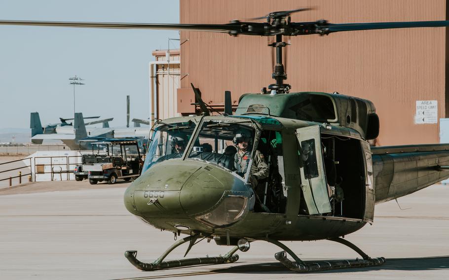 Maj. Joshua Hartmann prepares to pilot Kirtland’s 55-year-old UH-1N Huey helicopter on March 22, 2024 after it logged 20,000 flight hours earlier in the week. 