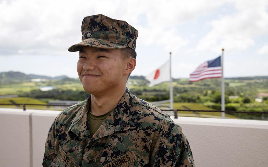 Cpl. Chue Lee, a radio operator with the 12th Marine Littoral Regiment, is promoted during the Resolute Dragon exercsie at Camp Ishigaki, Okinawa, Aug. 1, 2024. He is the first Marine to be promoted into the non-commissioned officer ranks on Ishigaki.