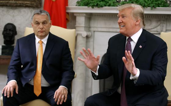 Then-President Donald Trump speaking while sitting next to Hungarian Prime Minister Viktor Orban, May 13, 2019.