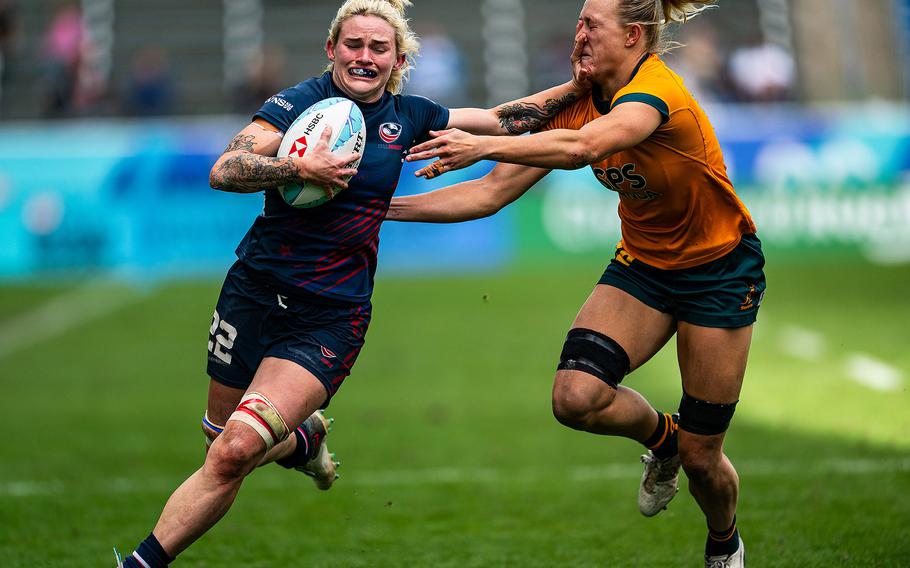 U.S. Army Capt. Sammy Sullivan stiff-arms an Australian player during a semifinal rugby sevens match during the Los Angeles SVNS tournament on March 3, 2024, at Dignity Health Sports Park in Carson, Calif. Sullivan will be competing for the U.S. women's rugby sevens team during the 2024 Paris Olympics on July 28-30 at Stade de France in Saint-Denis, France.