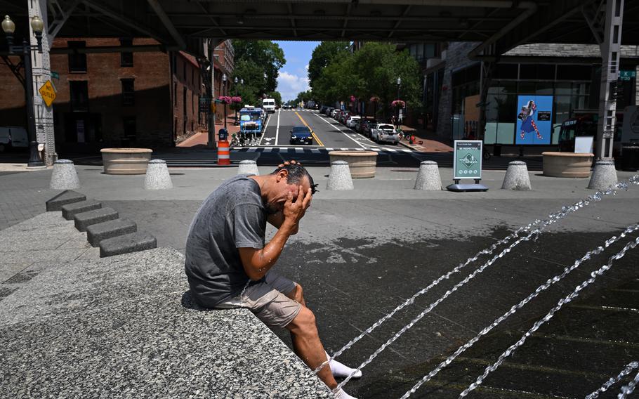 Santos Tejeda cools off at Georgetown Waterfront Park in D.C. on Tuesday. 