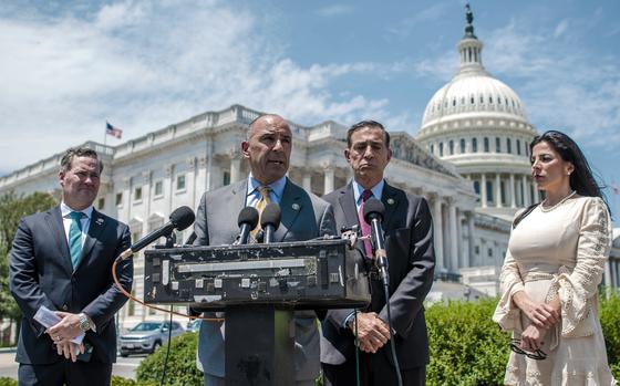 Government officials in a briefing in Washington, D.C.