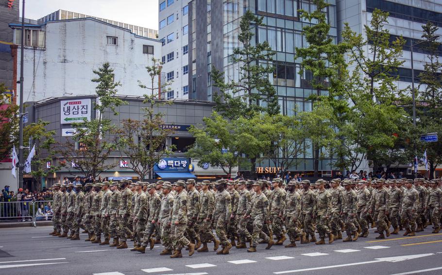 U.S. soldiers march through downtown Seoul during South Korea’s Armed Forces Day parade, Tuesday, Oct. 1, 2024.