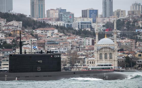 Russian sailors stand on the bridge of the Russian Navy’s Kilo-class submarine Rostov-na-Donu B-237 as it transits the Bosphorus Strait en route to the Black Sea on Feb. 13, 2022, in Istanbul, Turkey.