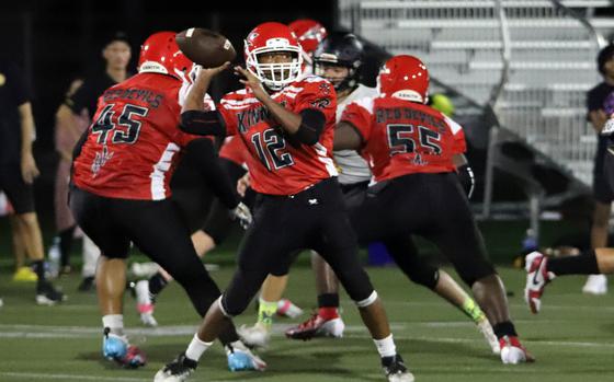 Senior quarterback Arashi Blocton threw for a touchdown pass and ran for two others for Kinnick.