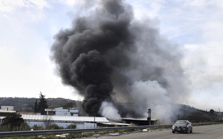 Smoke rises from a factory 