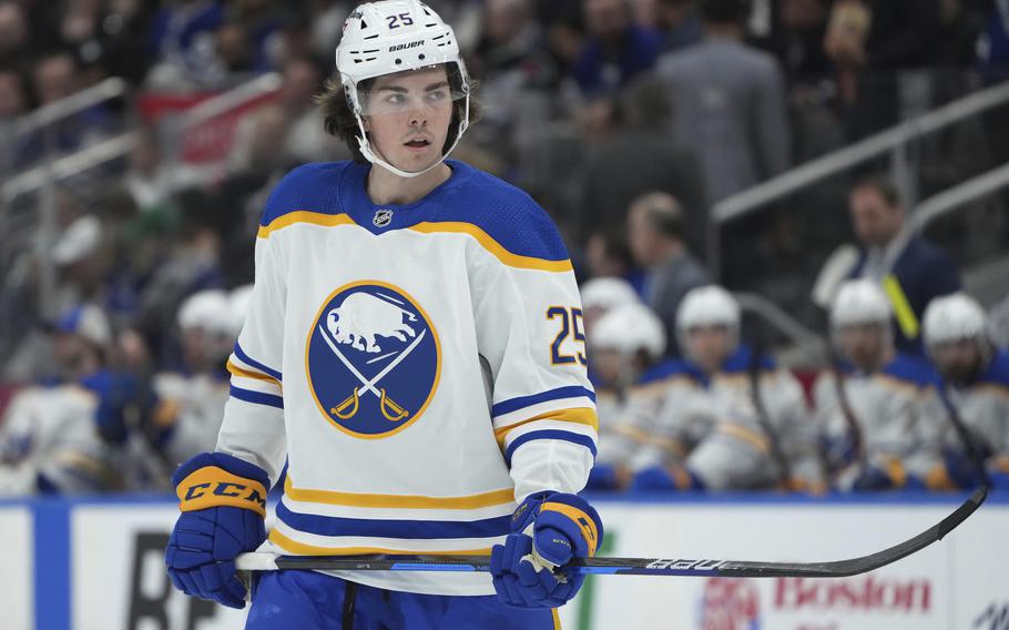 Buffalo Sabres defenseman Owen Power was among five college players who debuted Tepauses during the first period of the team’s NHL hockey game against the Toronto Maple Leafs oin Tuesday, April 12, 2022, in Toronto. (Nathan Denette/The Canadian Press via AP)