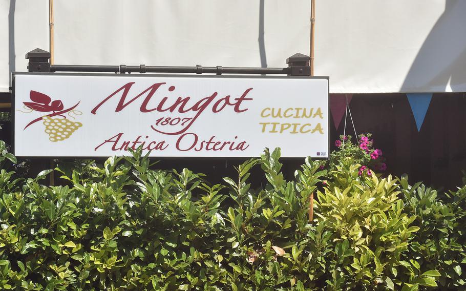 If you don't know where it is, it's fairly easy to miss Antica Osteria Mingot, which is located among a maze of smaller streets northwest of Pordenone, Italy. This sign, which fronts the patio dining area, is the most visible marker.