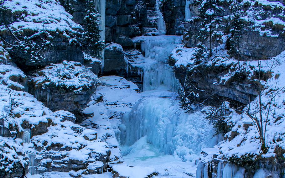 The ice-covered Kuhflucht Waterfall, which is accessed via the ski lift on the Ried in Farchant, makes a picturesque destination in the Zugspitz region of Germany.