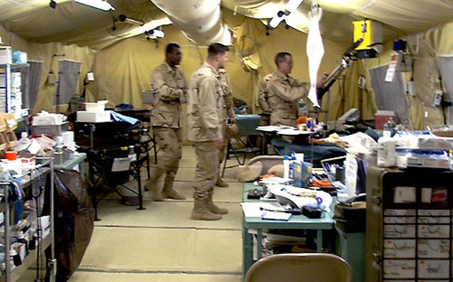 This is one of the maze of tents that make up the 339th Combat Support Hospital medical facility at Bagram. This room includes a portable X-ray machine, far right.