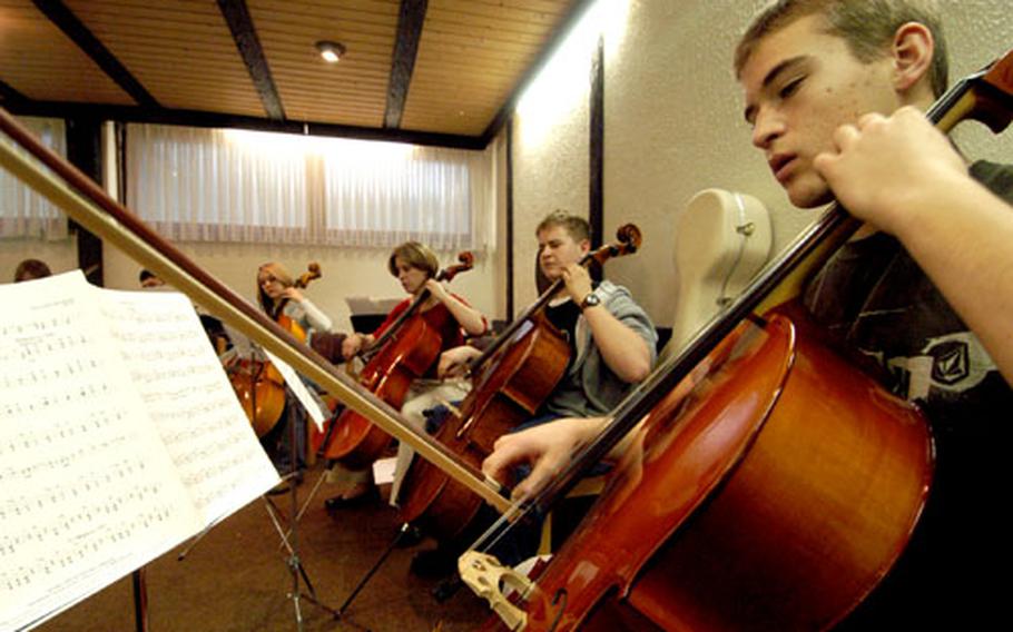 The cello section of the “String Stylings” workshop rehearses.
