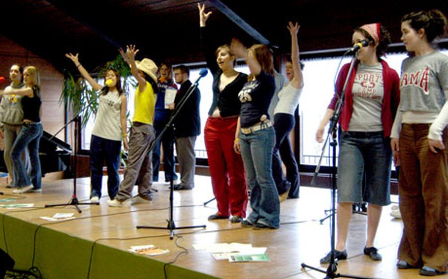 “Side Order of Salsa” workshop participants finish rehearsing a musical number.