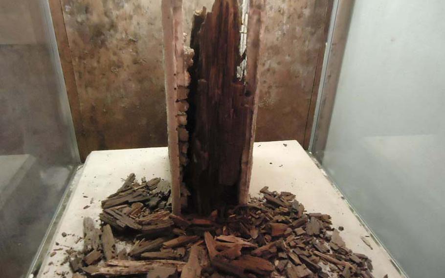 Inside the shelter, there are several display cases that show actual artifacts, circa 1945, that were excavated later from the site. Here, is the rotting wood from inside one of the shelter's concrete walls. The Tateyama Air-raid Shelter protected Nagasaki prefecture Gov. Wakamatsu Nagano and other important officials as the atomic bomb devastated the city around them on Aug. 9, 1945. 