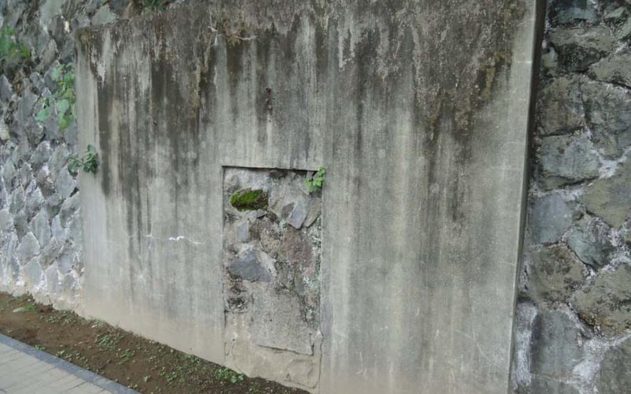 Next to the Tateyama Air-raid Shelter's open entrance, sits one that was blocked with rock and cement, in an effort to keep people out. The shelter protected Nagasaki prefecture Gov. Wakamatsu Nagano and other important officials as the atomic bomb devastated the city around them on Aug. 9, 1945. 