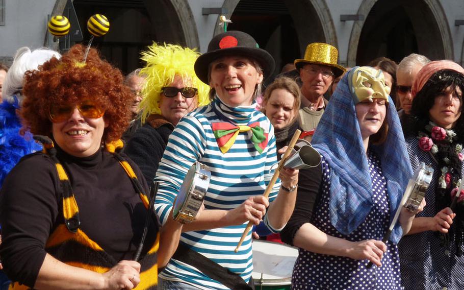 A costumed percussion band entertains spectators during Fasching celebrations in Munich last year.