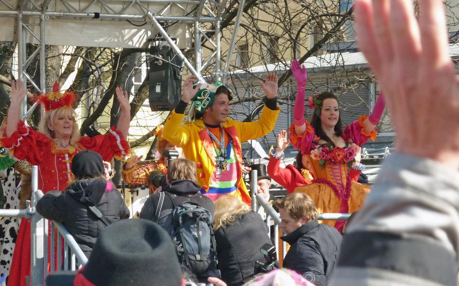 Market women, with their dance instructor at center, perform during the Dance of the Market Women on Fat Tuesday last year in Munich, Germany. The dance, a unique part of the city&#39;s Fasching celebrations, attracts jam-packed crowds to Munich&#39;s Viktualienmarkt.