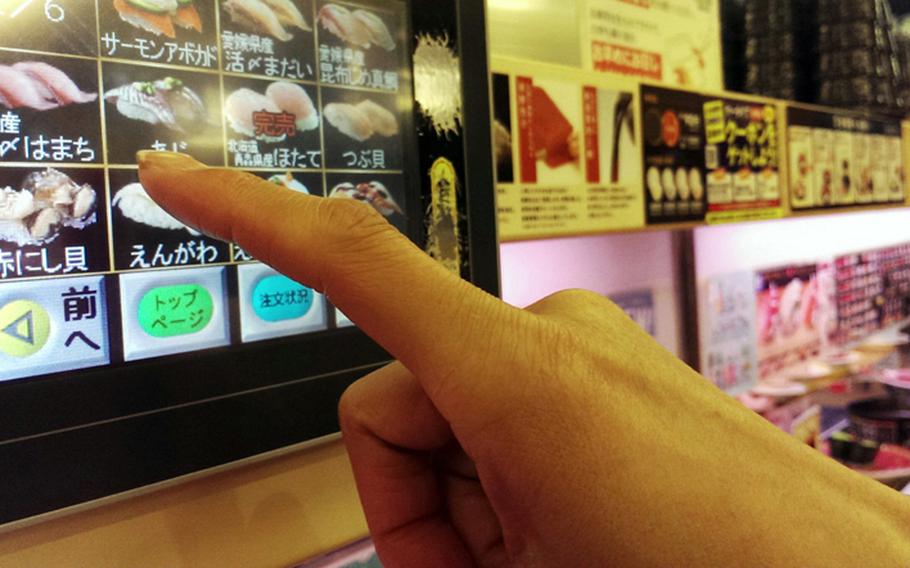 Like most modern sushi train restaurants in Japan, Hamazushi offers an illustrated touchscreen menu in case nothing on the conveyor belt appeals.