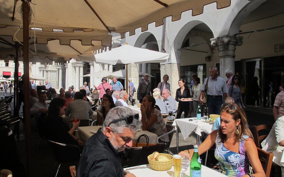 Outside seating at Angolo Palladio, a restaurant in Vicenza, Italy, on nice days and warm nights is hard to beat and popular with tourists and locals alike.