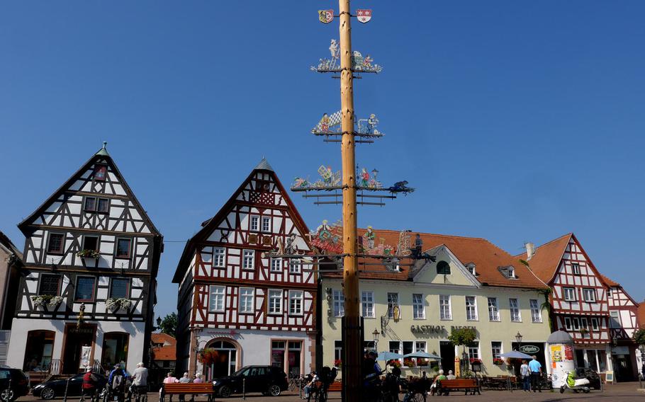 A view of the Seligenstadt, Germany, marketplace square. The maypole features the history of the town's craftsmen.