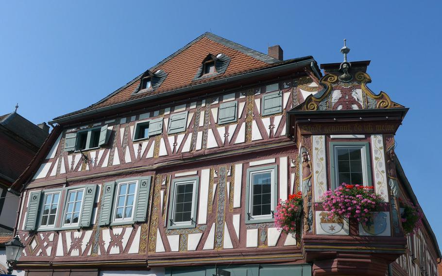 The late 16th-century Einhardhaus, a richly adorned half-timbered building on Seligenstadt, Germany's market square. The German town on the Main River is full of beautiful houses built in this style. Seligenstadt's complete Old Town district  is under historic preservation.