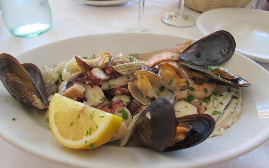 Da Angelo's sizeable, 12-euro seafood salad, with fresh shrimp, clams, mussels, squid, fish and more, compares favorably with more expensive seafood salads elsewhere in Vicenza, Italy.