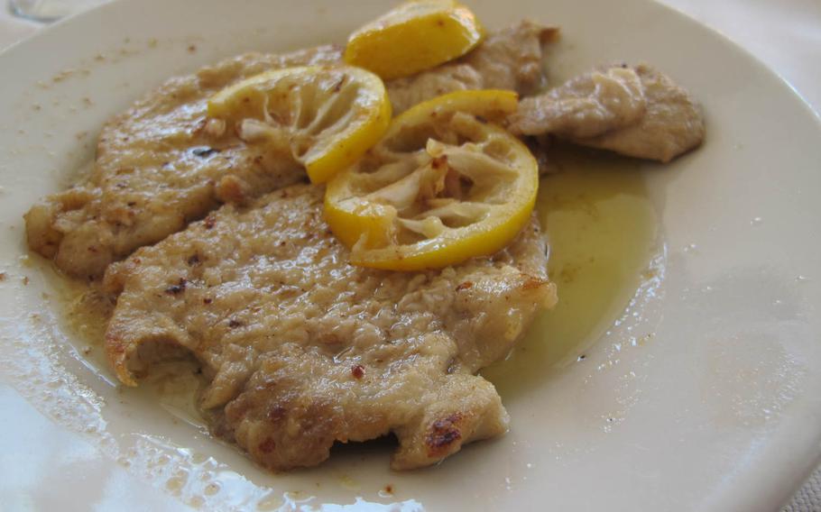 Da Angelo's tasty, tender veal scallopine with lemon swims in a buttery sauce and costs less than 6 euros. The restaurant is located on the outskirts of Vicenca, Italy.