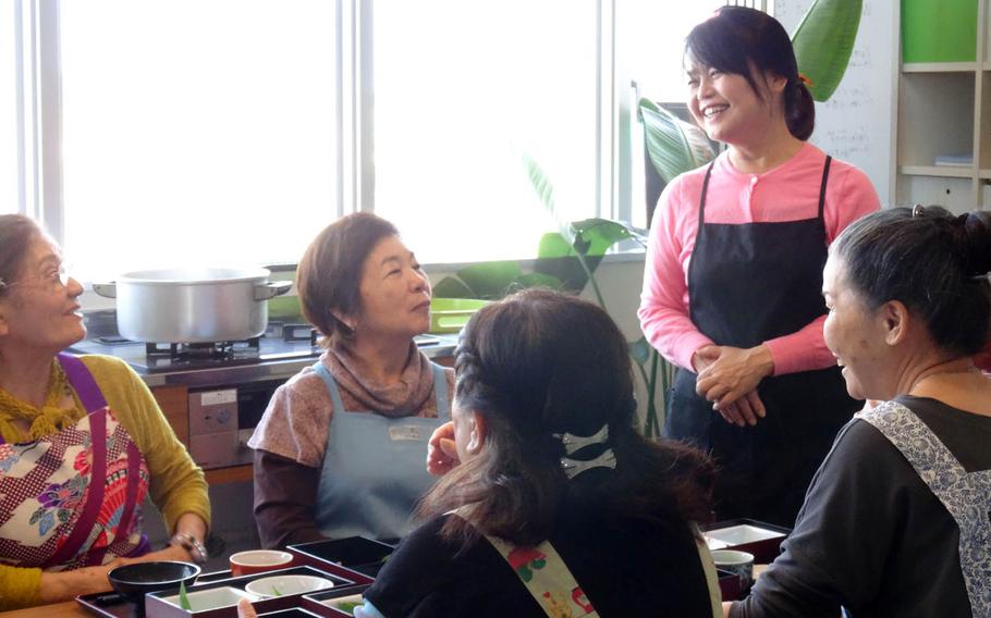 Kae Izena shares cooking tips recently at her cooking school in Okinawa, Japan. Her goal is to restore Okinawans' longevity by bringing Okinawan vegetables back into every home.